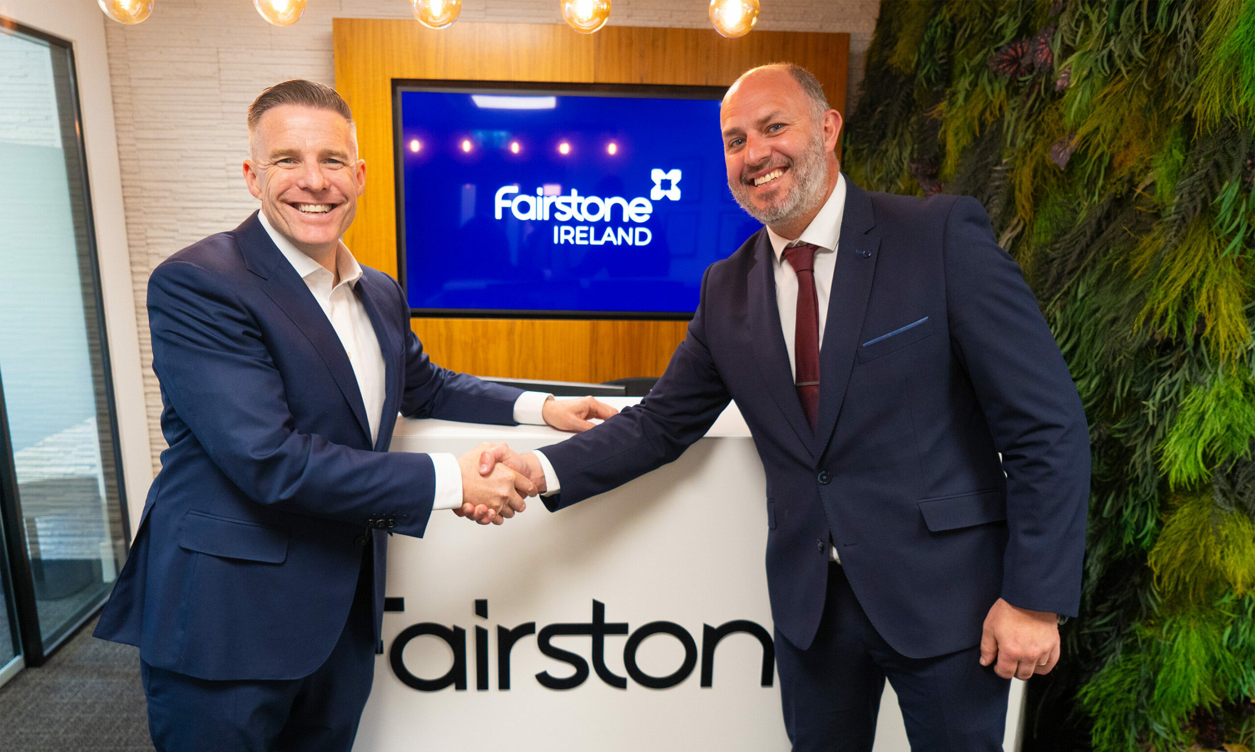 Fairstone Ireland CEO Paul Merriman shaking hands with Cleere Life & Pensions Director Gearoid Cleere