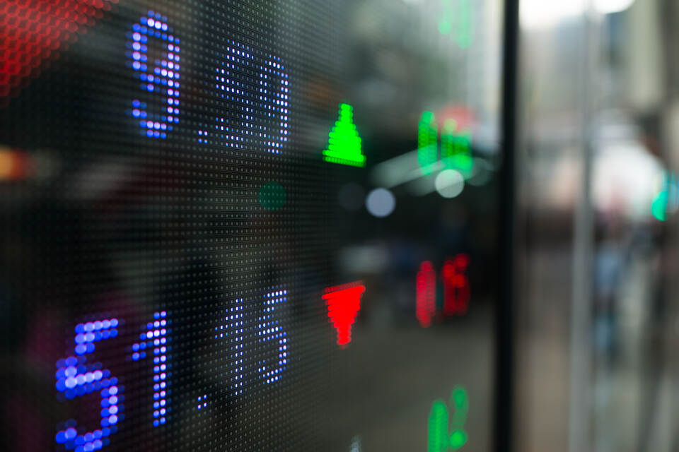 A trading board featuring a variety of colorful numbers that indicate stock prices and market fluctuations in real-time.