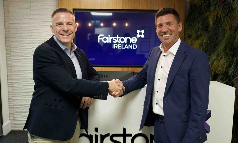Fairstone Ireland CEO Paul Merriman shaking hands with DMFs Managing Director Declan Maher