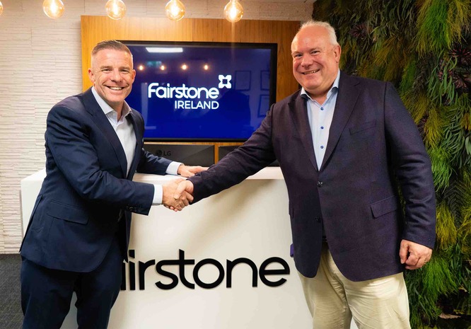 From left, Paul Merriman, Fairstone Ireland CEO and Marc Westlake, Everlake Managing Director, shaking hands with Fairstone logo in the backgound